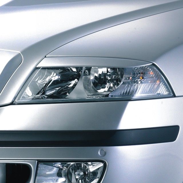 Kryty světlometů Milotec (mračítka) - ABS černá metalíza, Škoda Octavia II